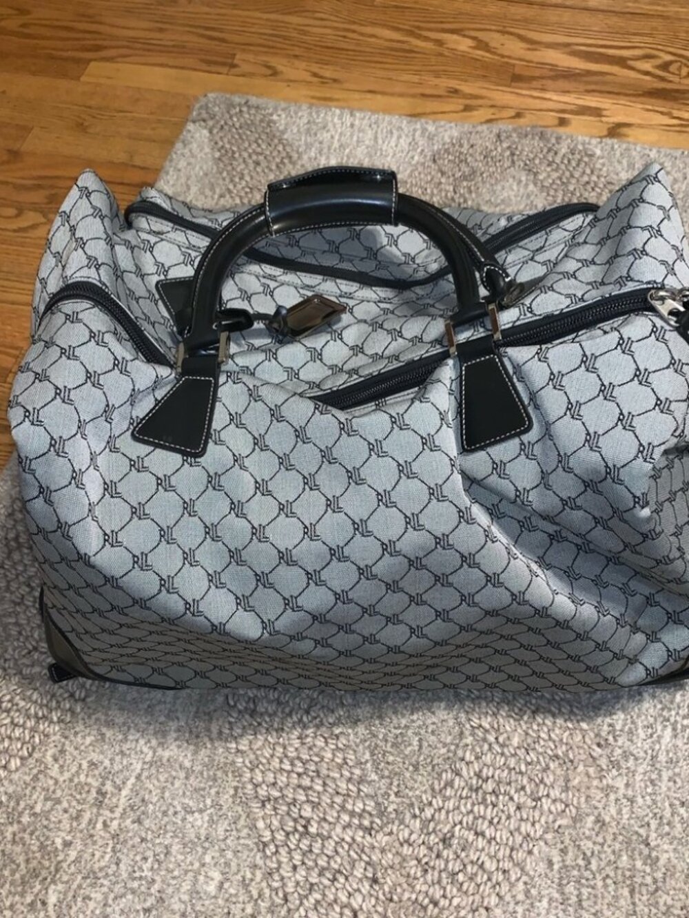 Four-piece Ralph Lauren RL Monogram luggage set